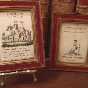 Antique framed grammer pictures.